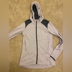 Oakley lilac zip up jacket; women’s small.